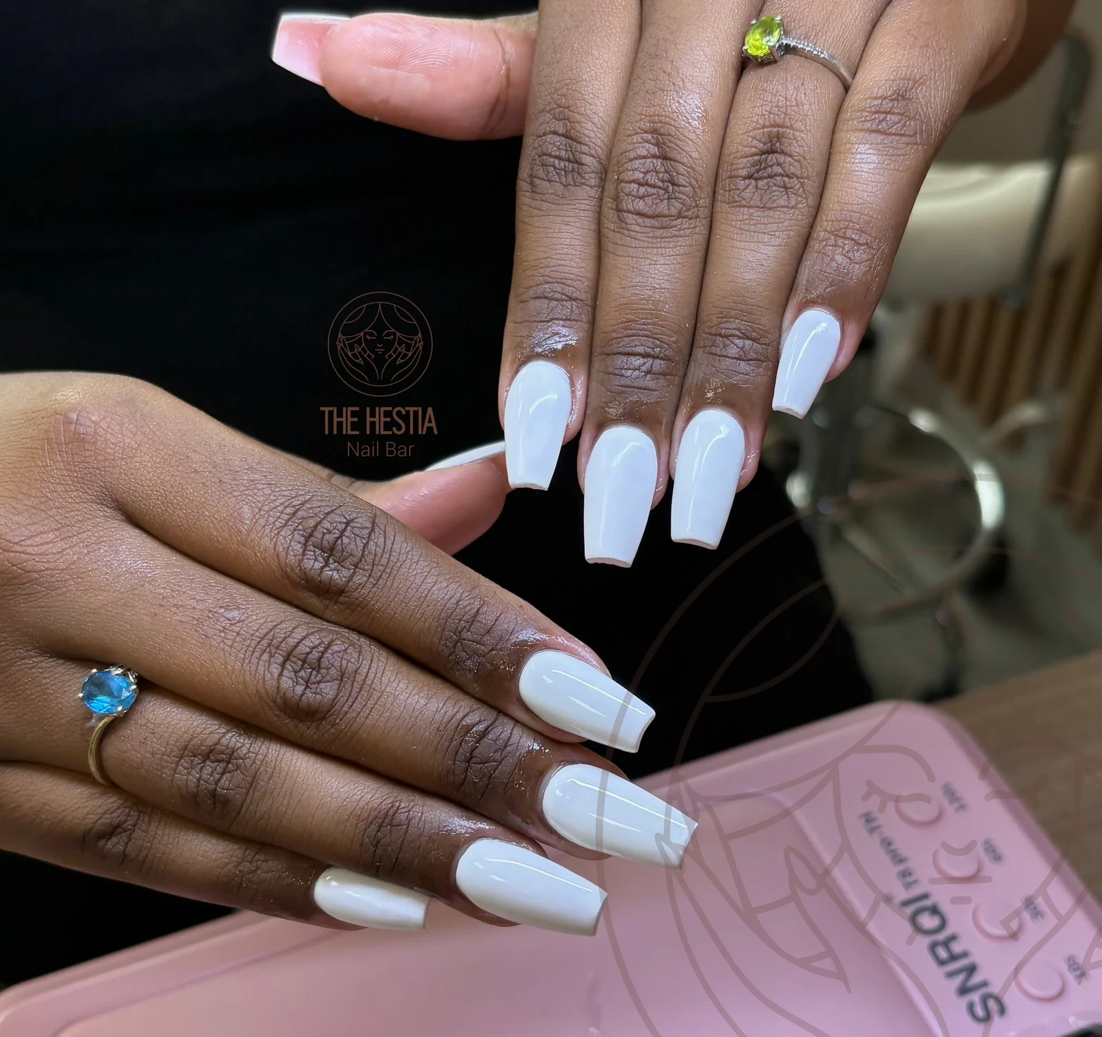 Glossy white coffin-shaped nails by The Hestia Nail Bar